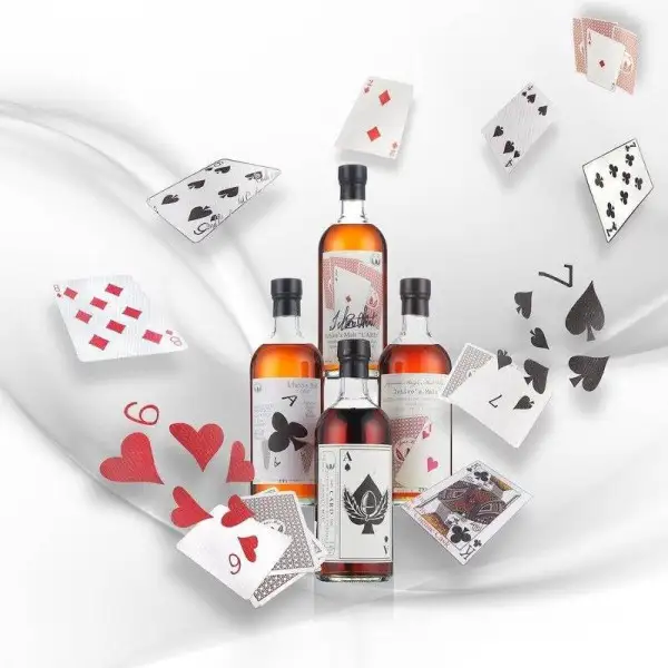 Fante di Quadri o Asse di Picche? All'asta a Hong Kong il whisky giapponese con le carte in etichetta
